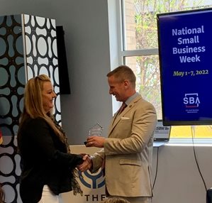 Sherry accepting award