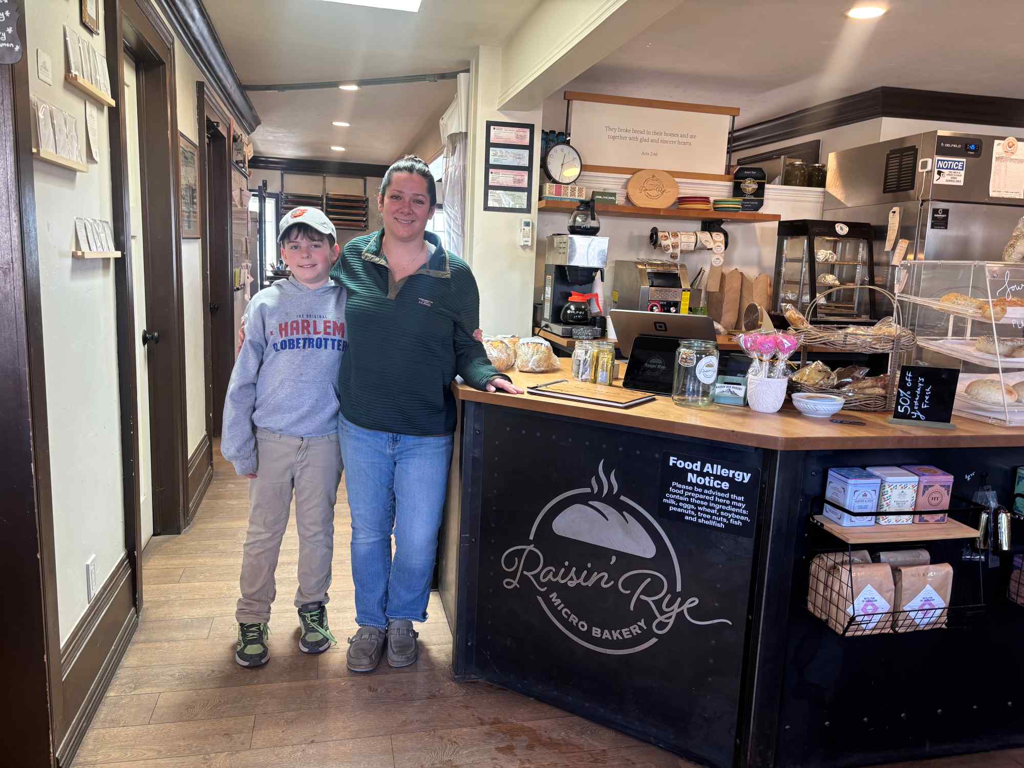 raisin rye bakery counter with owner and son