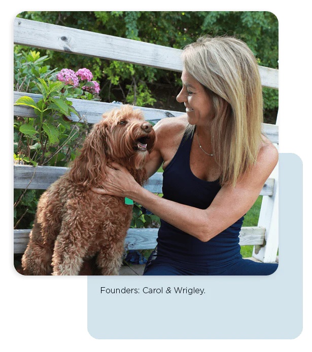 Woman smiling at her happy dog