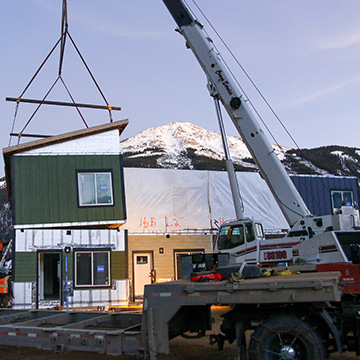 Anvil townhomes with mountains in back